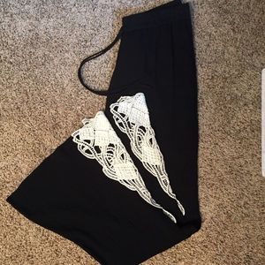Black Alya linen pants with detail.